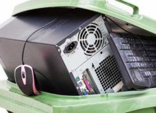 recycling bin with old computer