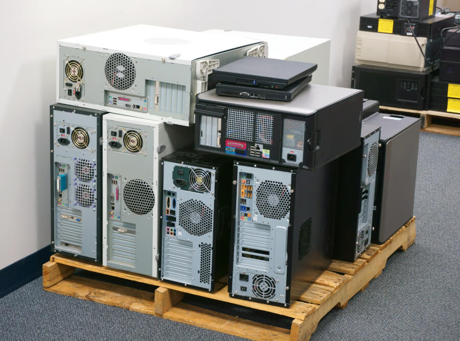 A Stack of old computers waiting to be recycled