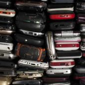 stack of old cell phones