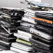 stack of old laptop computers